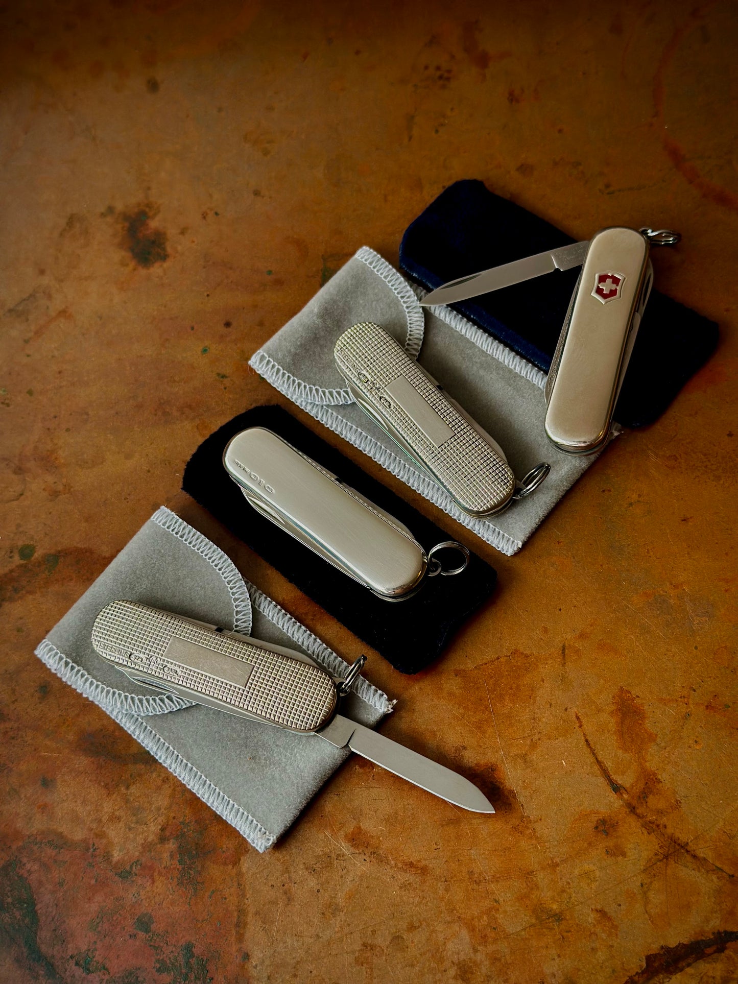 Lot of (4) Four Sterling Silver Victorinox Classic SD Pocket Knives