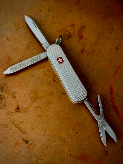 Lot of (4) Four Sterling Silver Victorinox Classic SD Pocket Knives