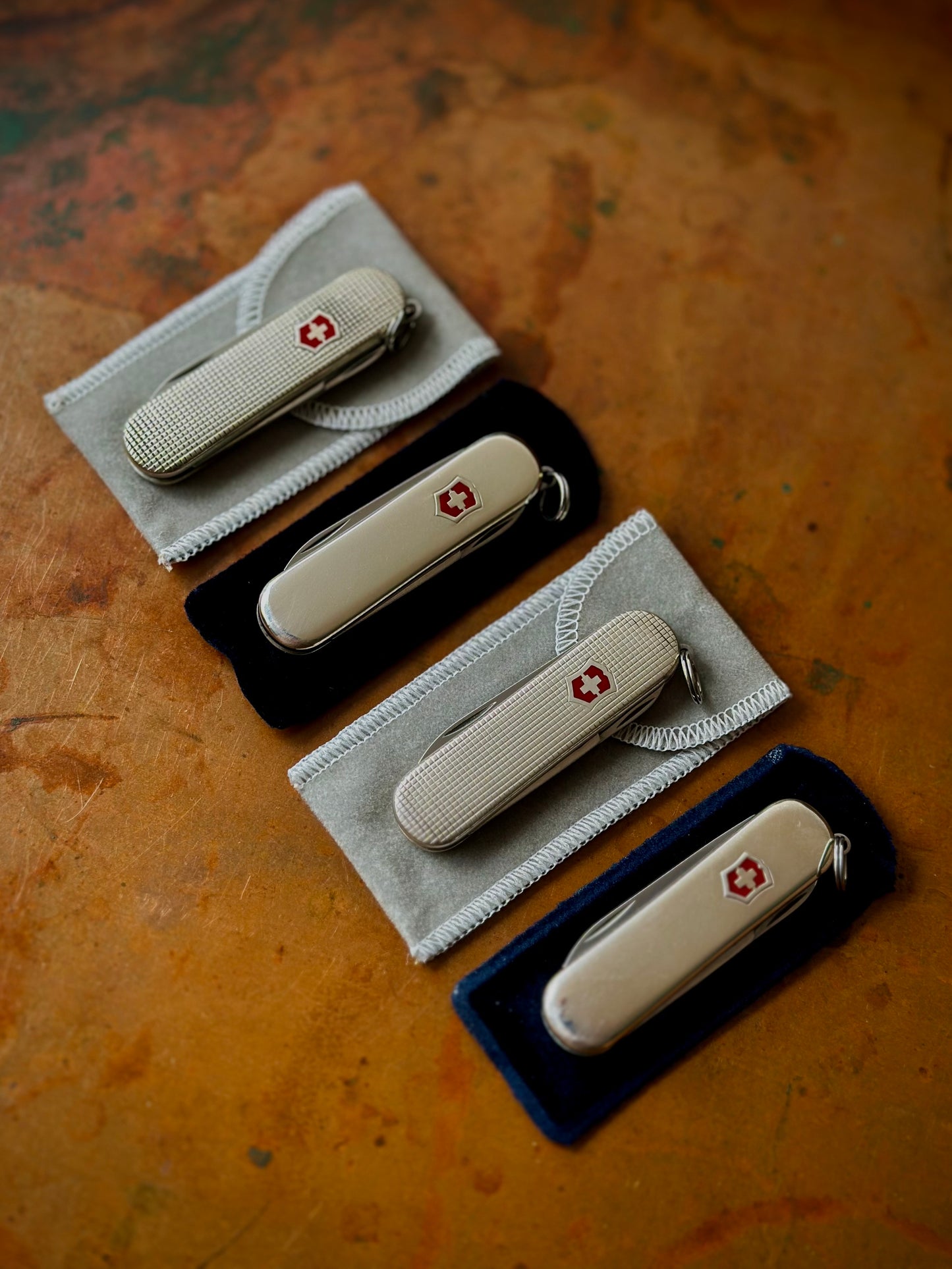 Lot of (4) Four Sterling Silver Victorinox Classic SD Pocket Knives