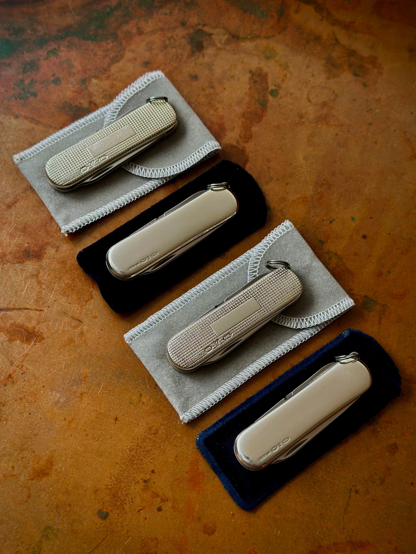 Lot of (4) Four Sterling Silver Victorinox Classic SD Pocket Knives
