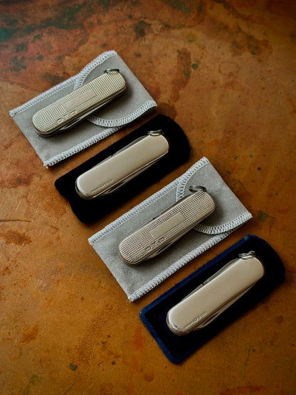 Lot of (4) Four Sterling Silver Victorinox Classic SD Pocket Knives