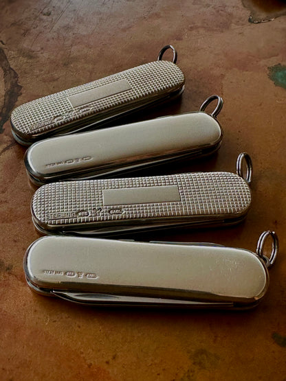 Lot of (4) Four Sterling Silver Victorinox Classic SD Pocket Knives