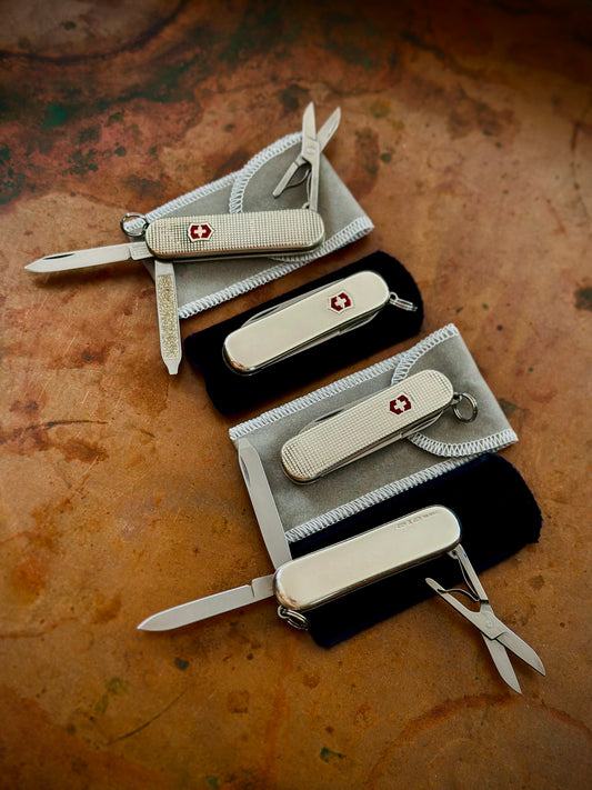 Lot of (4) Four Sterling Silver Victorinox Classic SD Pocket Knives
